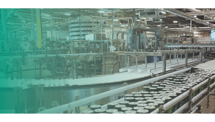 Conveyor running through a packaging line, with the text “Performance Lives Between the Machines.”